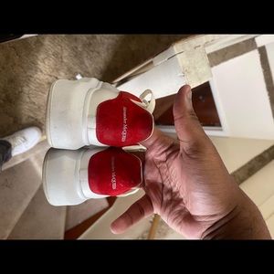 Selling my boyfriends white and red Alexander McQueens size 8.5